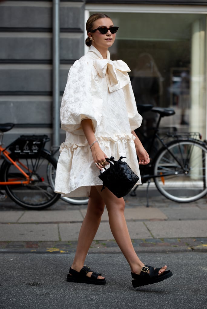 Monochrome styling is an easy way to highlight an intricate puff-sleeve dress