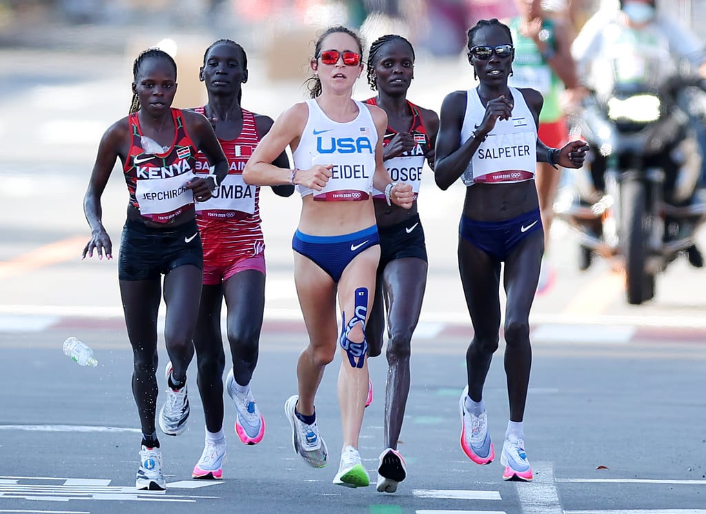 Molly Seidel leads the pack in the women's marathon at the 2021 Olympics.