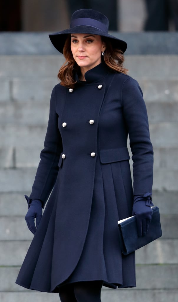 When she attended a memorial service for victims of the Grenfell Tower tragedy that took place in London, Kate wore an elegant navy coat with silver buttons from Carolina Herrera.