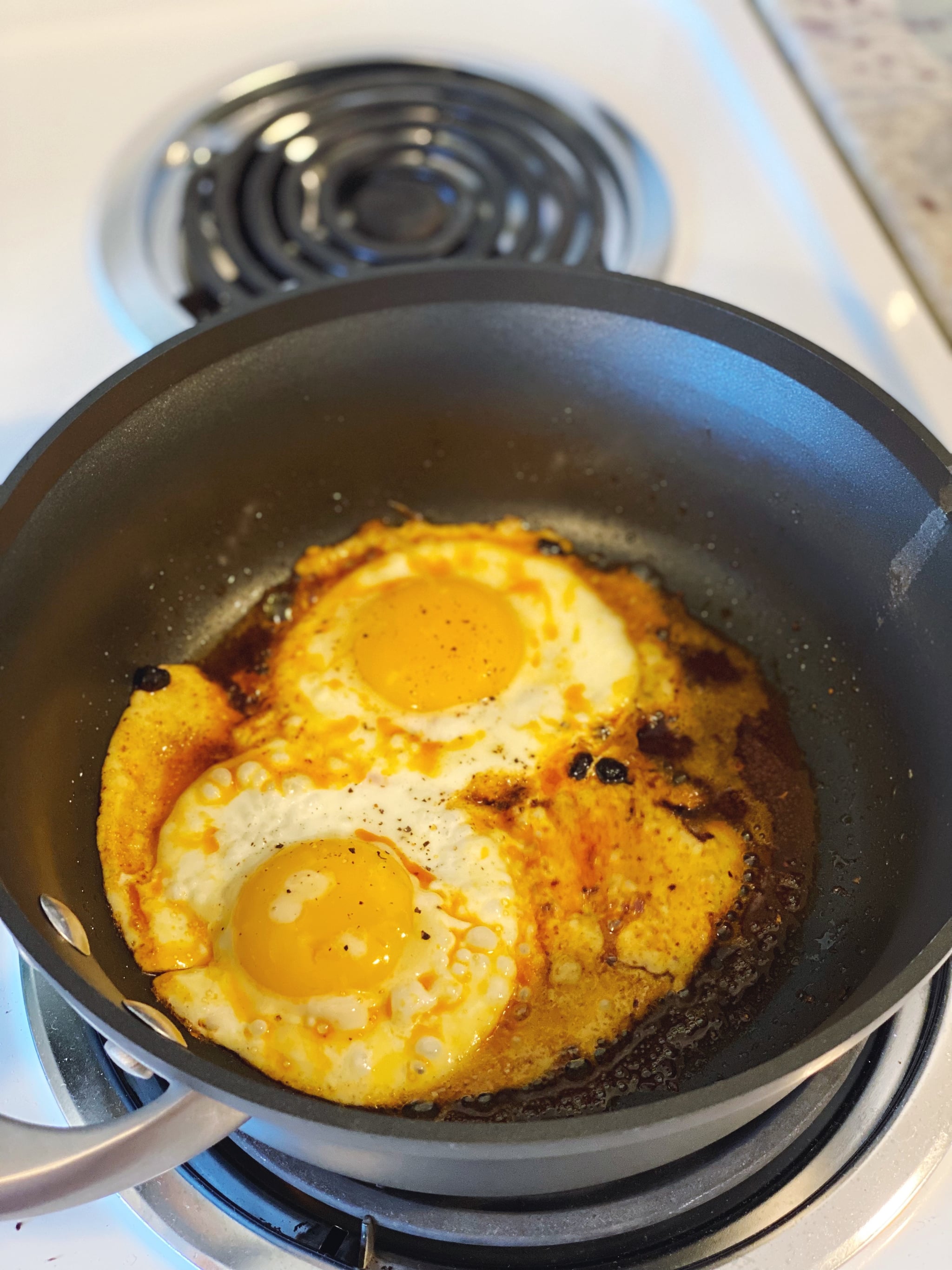 Eggs fried in feta and chilli crisp oil (viral recipe)