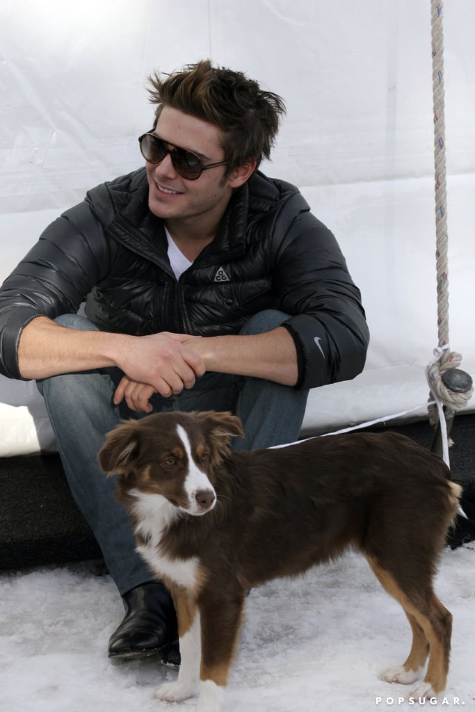 Zac Efron had furry friends to keep him warm in Aspen in 2009.