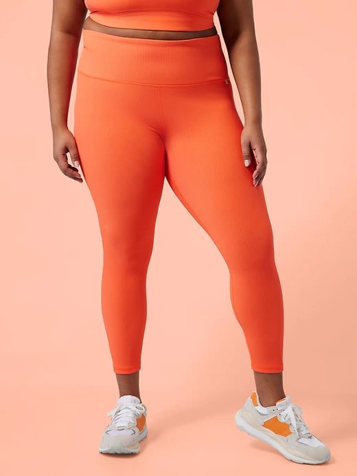 Womens clothing sizing- same fabric type, orange is an Athleta