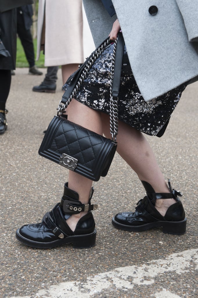 A tough-girl boot is a perfect counterpoint to a classic Chanel bag and sequins.