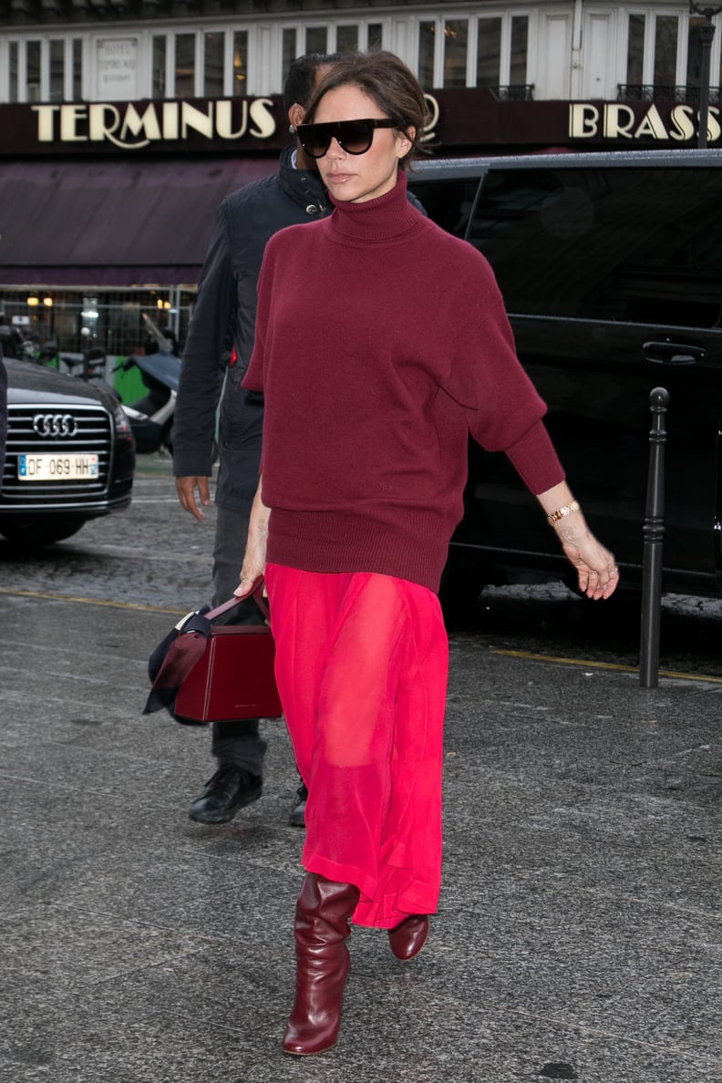 And Swapped the Runway Bag For a Burgundy One to Match Her Outfit