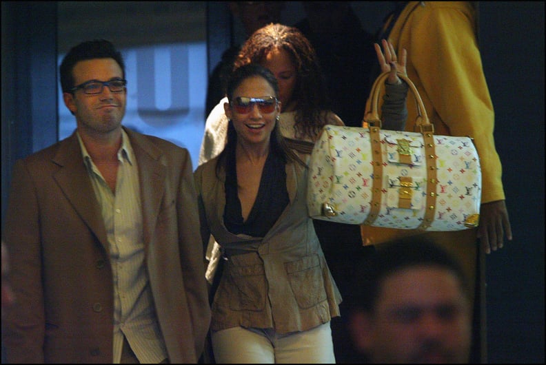 FRANCE - APRIL 08:  Jennifer Lopez and Ben Affleck shopping in Paris, France on April 08, 2003 - With Louis Vuitton bag.  (Photo by Pool LE FLOCH/TRAVERS/Gamma-Rapho via Getty Images)