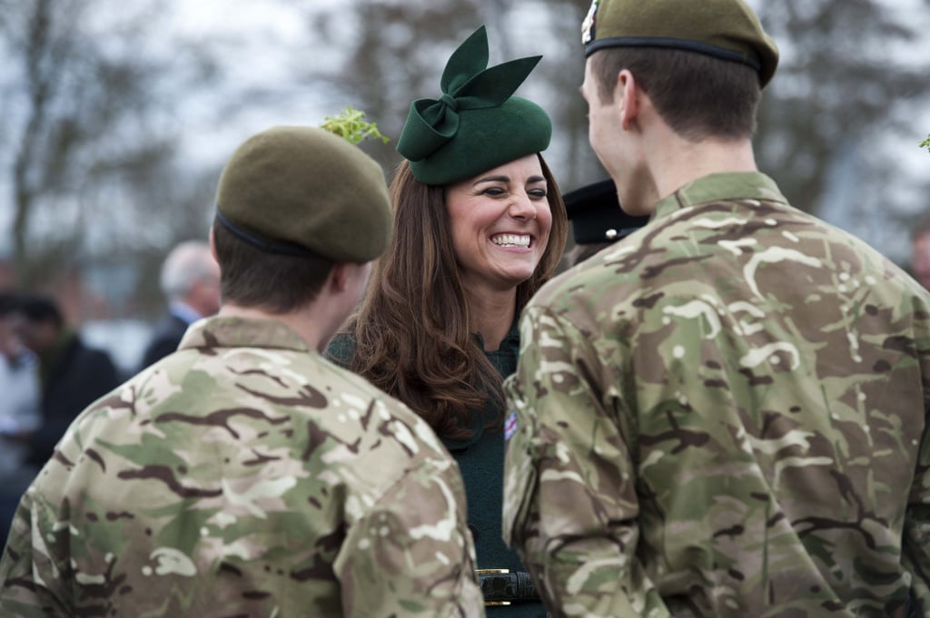 Kate Middleton had a good laugh as she participated in an annual St. Patrick's Day tradition of visiting the Irish Guards in Aldershot, England, on Monday.