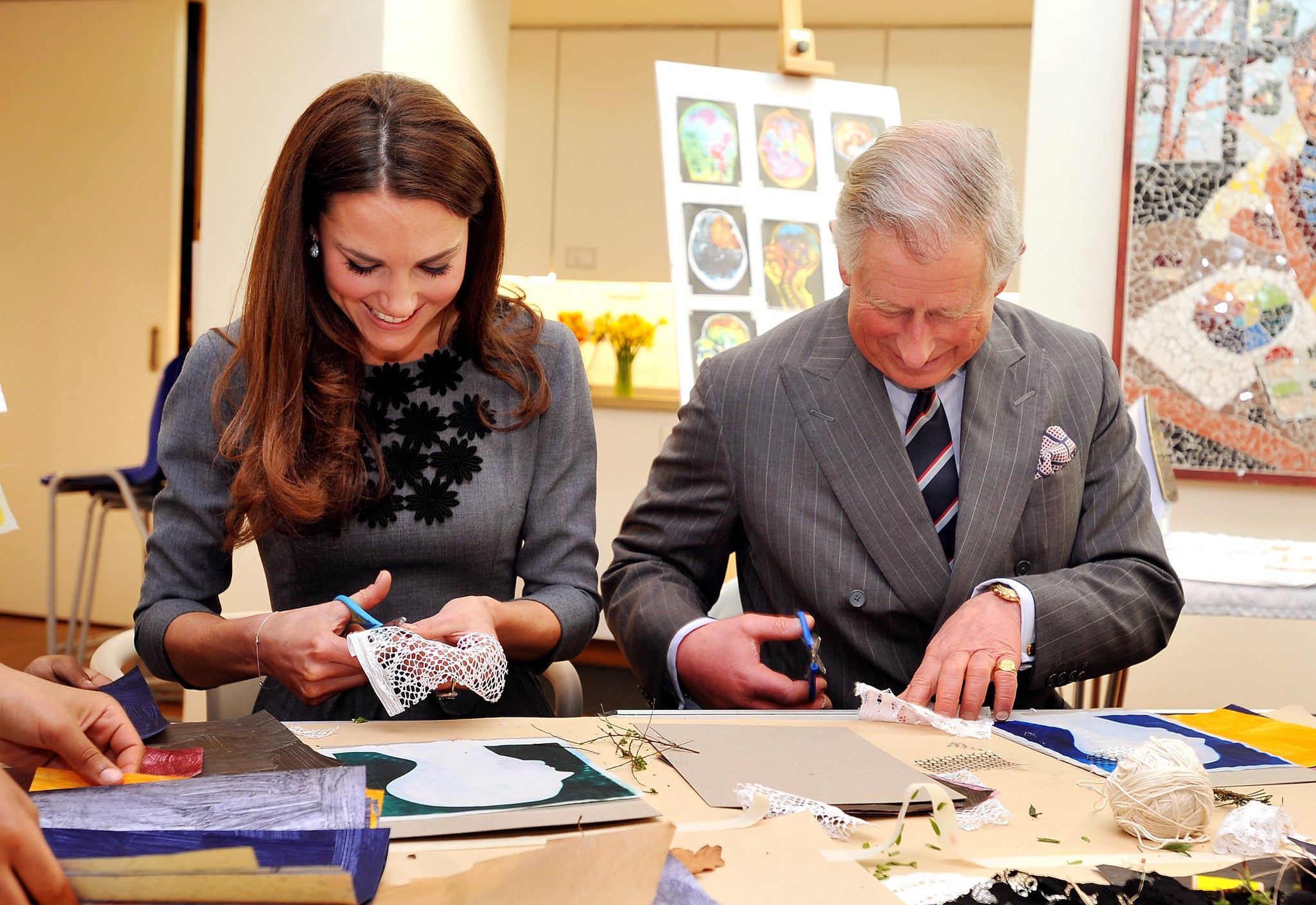 LONDON, UNITED KINGDOM - MARCH 15:  Catherine, Duchess of Cambridge and Prince Charles, Prince of Wales join children producing artwork during a visit to the Dulwich Picture Gallery on March 15, 2012 in London, England. The Duchess of Cambridge joined her parents-in-law Prince Charles, Prince of Wales and Camilla, Duchess of Cornwall on a royal visit to the gallery to celebrate their shared love of the arts and see work done by the Prince's Foundation for Children and the Arts. (Photo by Rota/Anwar Hussein Collection/Getty Images)