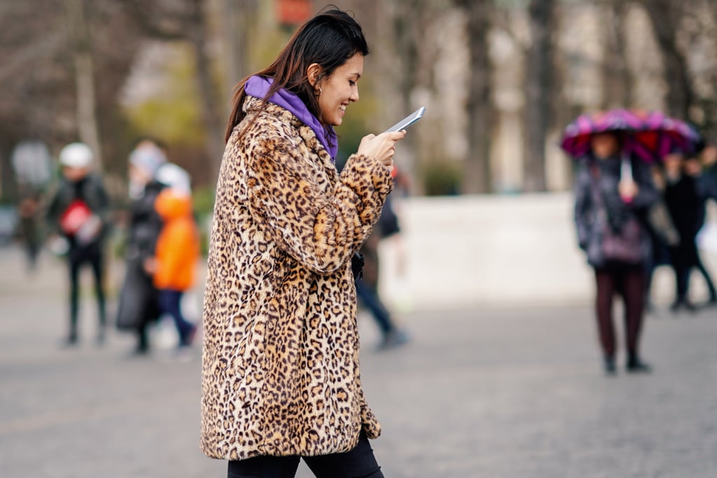 Style Your Leopard-Print Coat With: A Bright Hoodie and Black Jeans