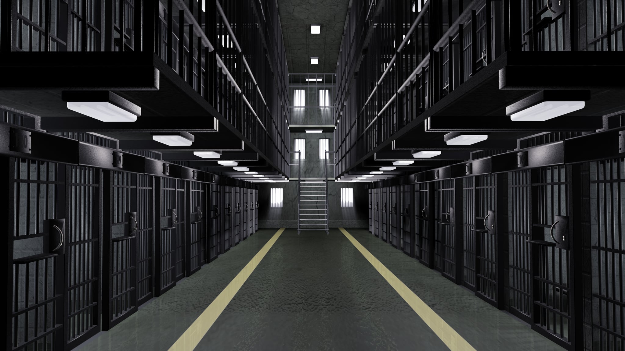 Dutch angle view looking up at the empty cells in a multi-tiered prison