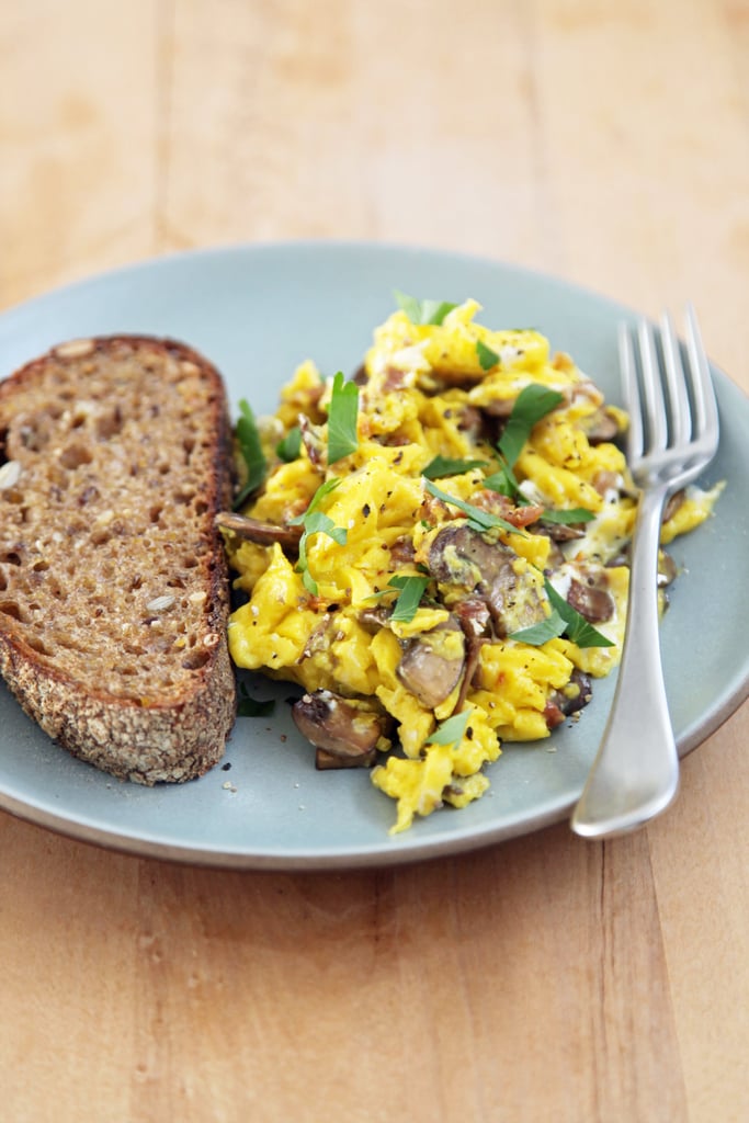 Scrambled Eggs With Wild Mushrooms, Sun-Dried Tomatoes, and Goat Cheese