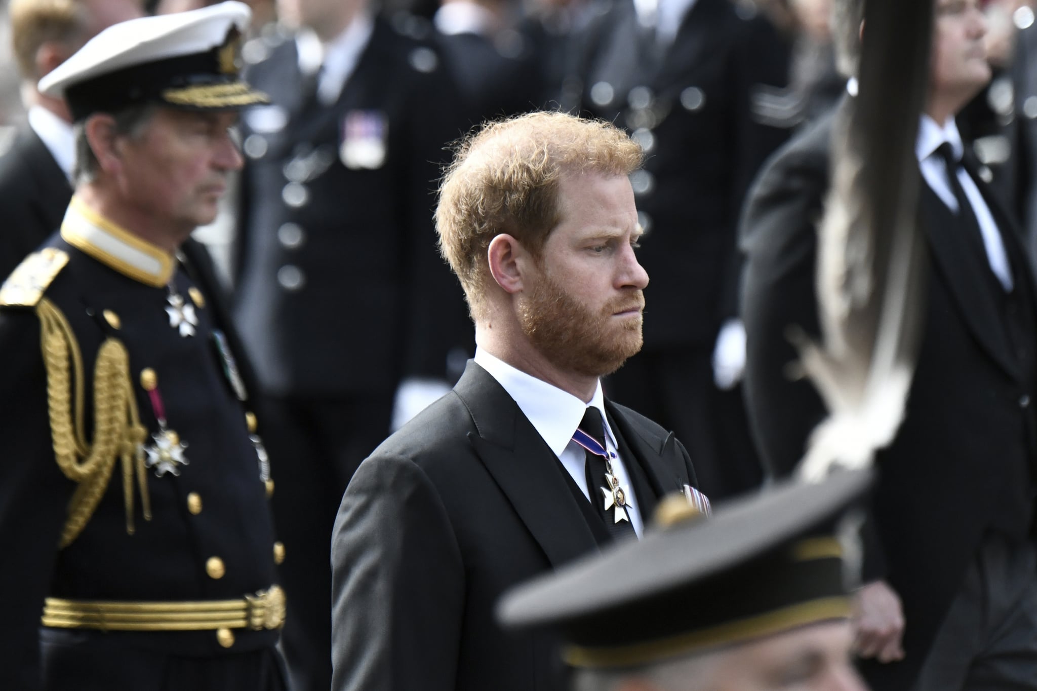 LONDON, ENGLAND - SEPTEMBER 19: Prince Harry, Duke of Sussex follows the coffin of Queen Elizabeth II, as it travels from Westminster Abbey to Wellington Arch, on September 19, 2022 in London, England. (Photo by Stephane de Sakutin - WPA Pool/Getty Images)