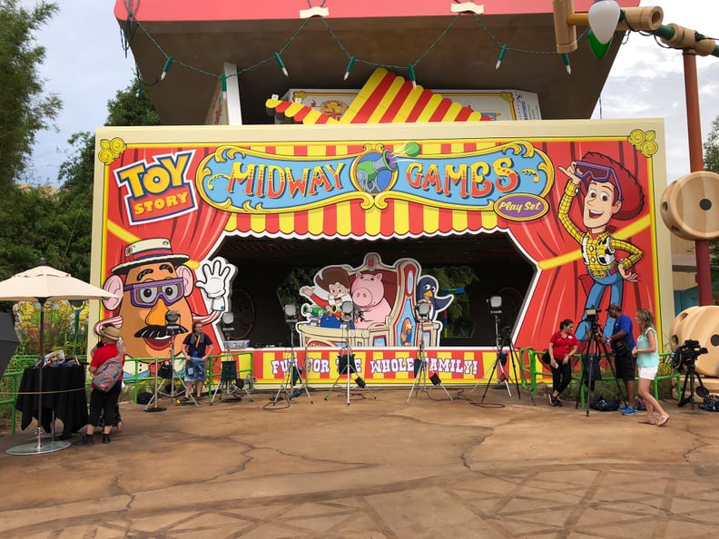 Find characters for photo ops in front of Toy Story Midway Games.