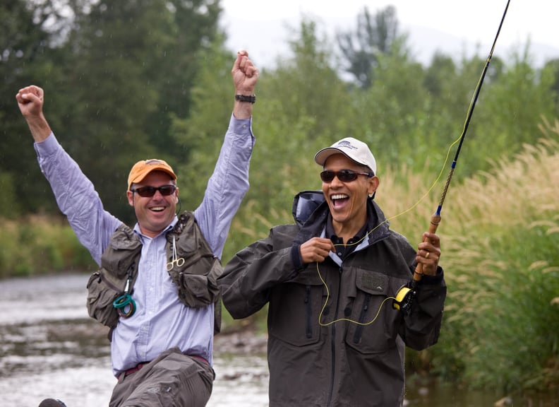 The president and his guide celebrating in Montana what they think is a successful catch only to find no fish on the hook.