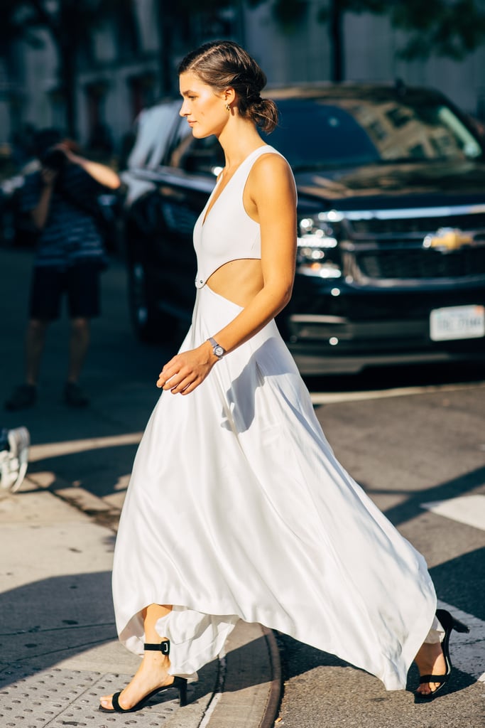 A slip cutout gown that could almost pass as bridal feels a little more relaxed with a low, walkable sandal.