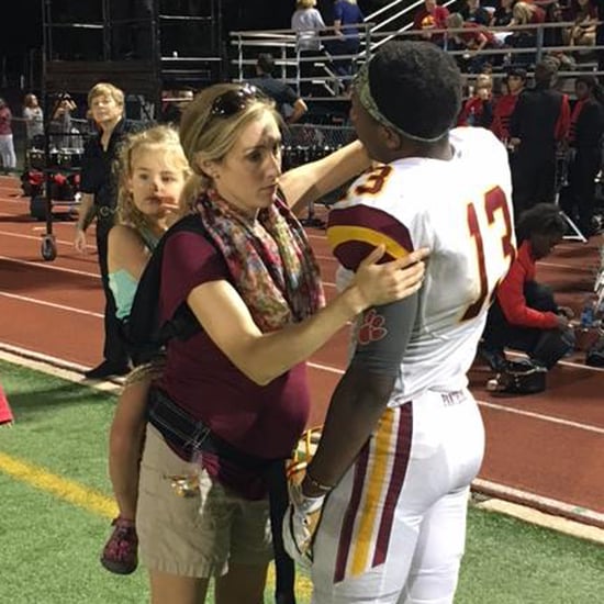 Pregnant Doctor Straps Her Kid on Her Back For Football Game