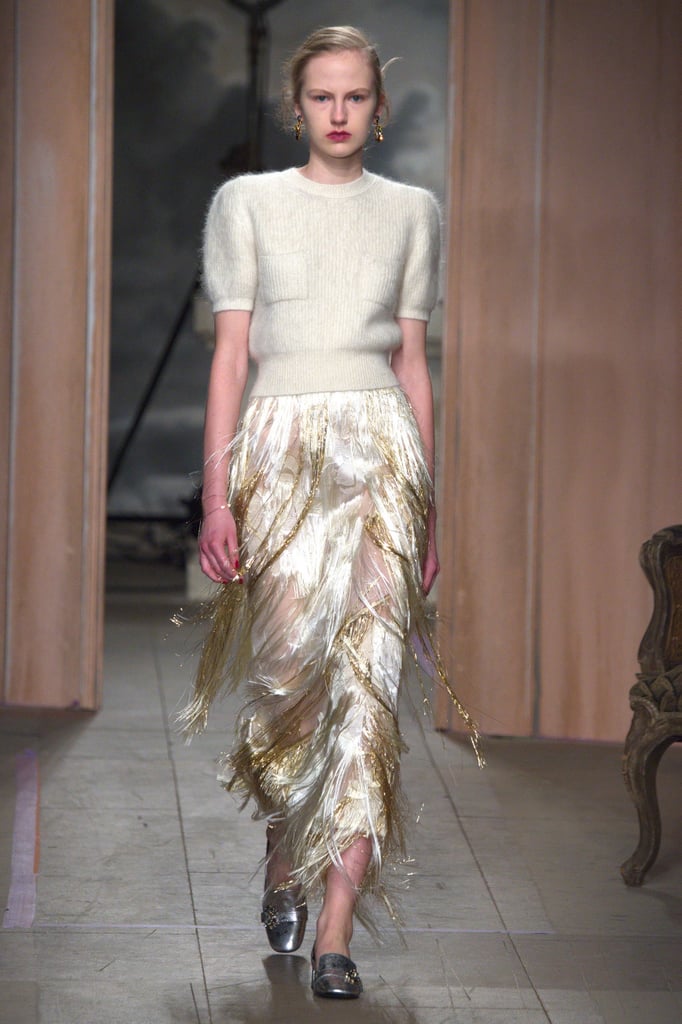 Work Your Favorite Fringe Skirt at the Office With a Simple Sweater and Loafers