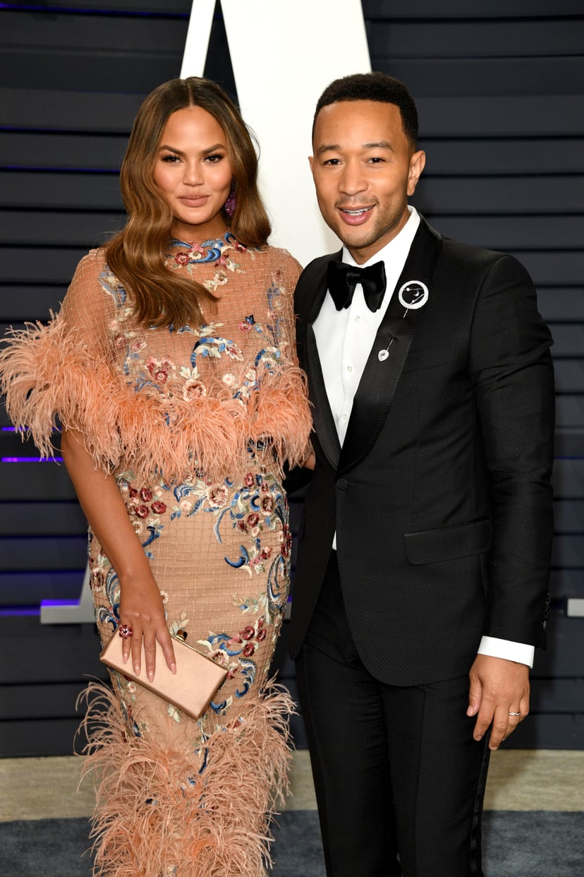 BEVERLY HILLS, CALIFORNIA - FEBRUARY 24: Christine Teigen  and John Legend attend 2019 Vanity Fair Oscar Party Hosted By Radhika Jones   at Wallis Annenberg Center for the Performing Arts on February 24, 2019 in Beverly Hills, California. (Photo by Daniel