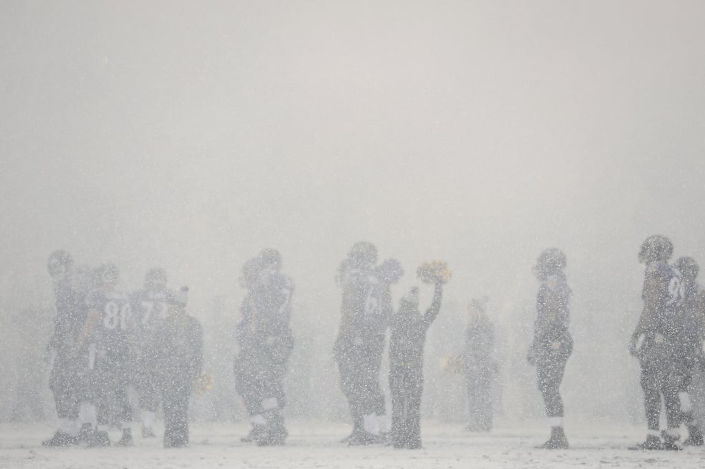 Heavy snow fell during a football game between the Baltimore Ravens and the Minnesota Vikings in Maryland.