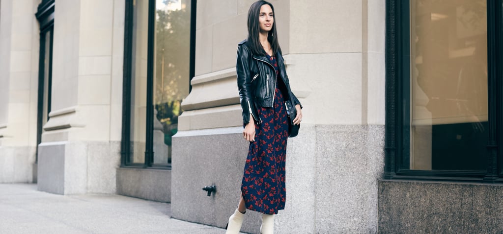 Dana styled a printed dress from the collab with a leather jacket and white boots for an easy, elevated take on day dressing that goes from the office to drinks after hours.