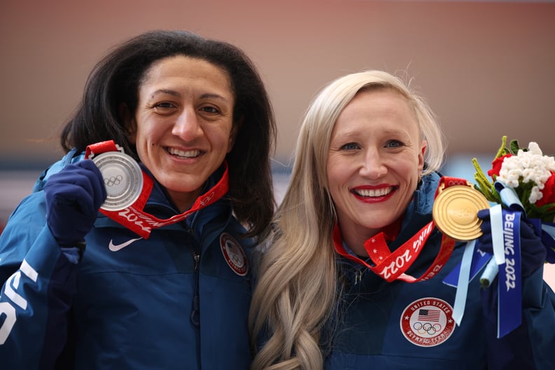 YANQING, CHINA - FEBRUARY 14:  (L-R) Silver medallist Elana Meyers Taylor of Team United States and Gold medallist Kaillie Humphries of Team United States celebrate during the Women's Monobob medal ceremony on day 10 of Beijing 2022 Winter Olympic Games a
