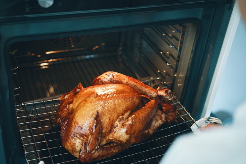 home cook checking to see if turkey is done without a thermometer