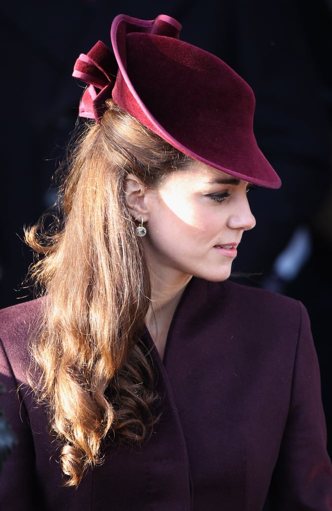 Back in 2011, for Kate's first Christmas Day church service as a member of the Royal Family, she chose a berry velvet hat designed by Jane Corbett.