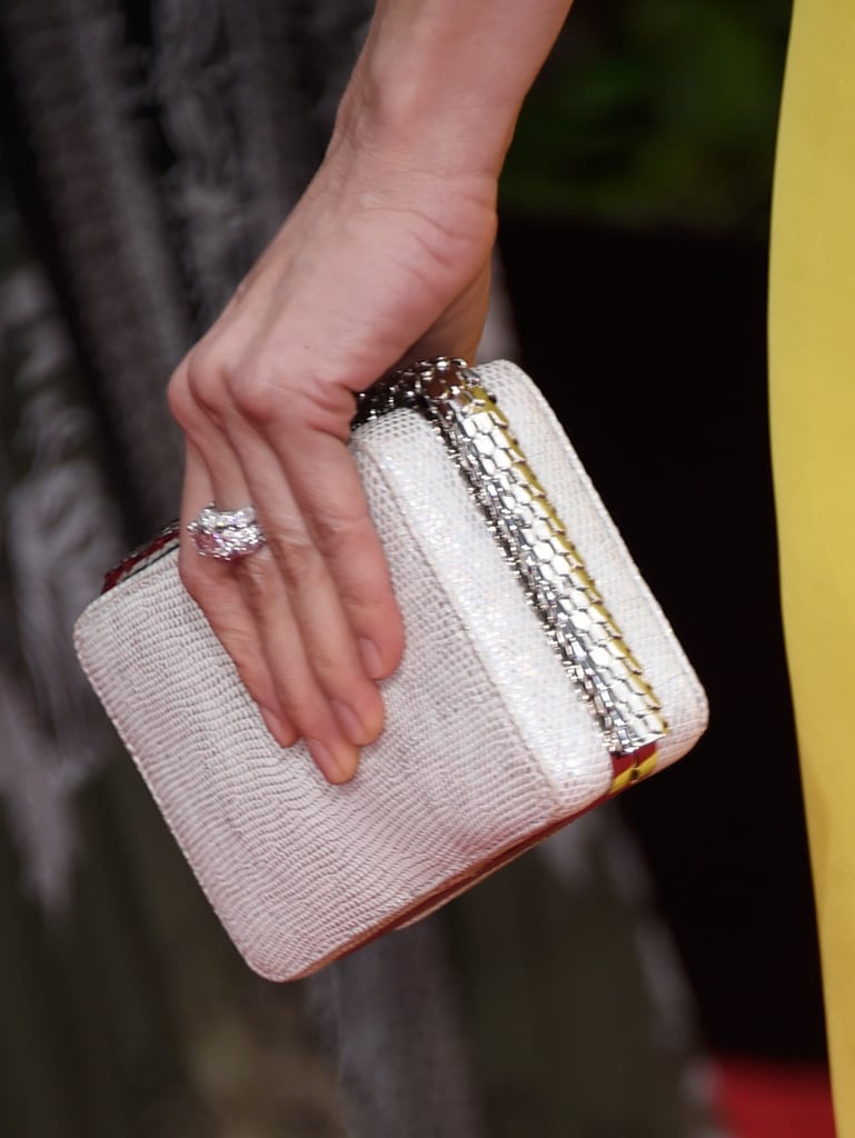 Naomi Watts's extra sparkle came in the form of Bulgari jewels and an exotic Bulgari clutch.