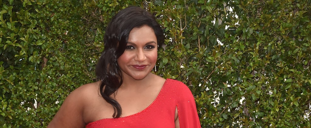 Mindy Kaling Wearing a Red Cape Dress