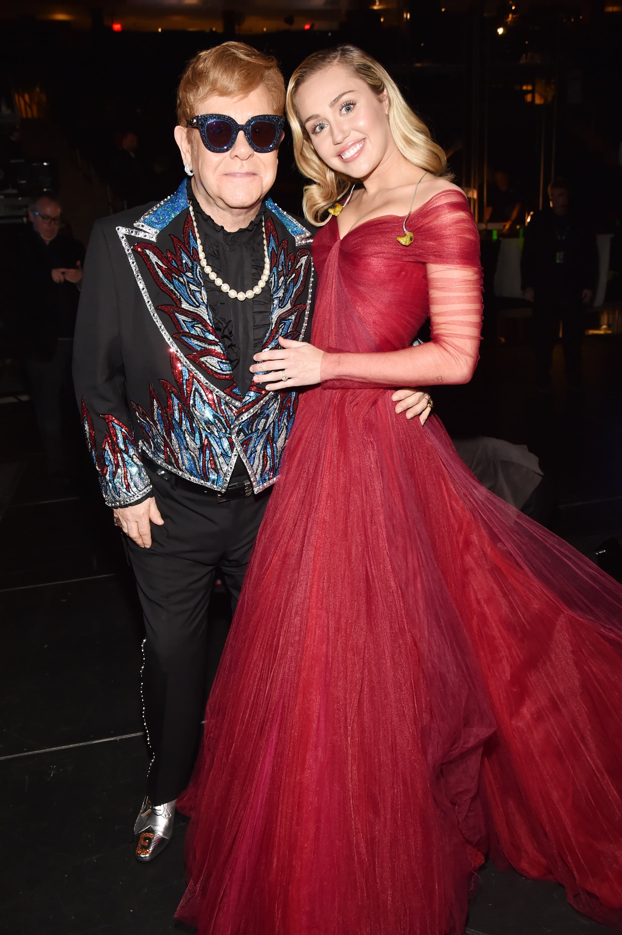 miley cyrus red dress grammys Miley Cyrus Nails 5 Outfit Changes at 2024 Grammys