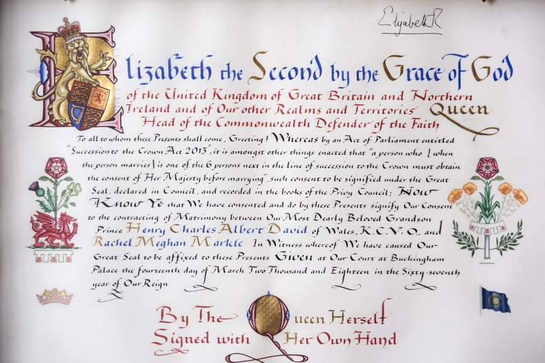 A picture taken at Buckingham Palace in London on April 12, 2018 shows the text and marginalia of the Instrument of Consent, an official State document that records the Queen's formal consent to Prince Harry's forthcoming marriage to Meghan Markle. - The 