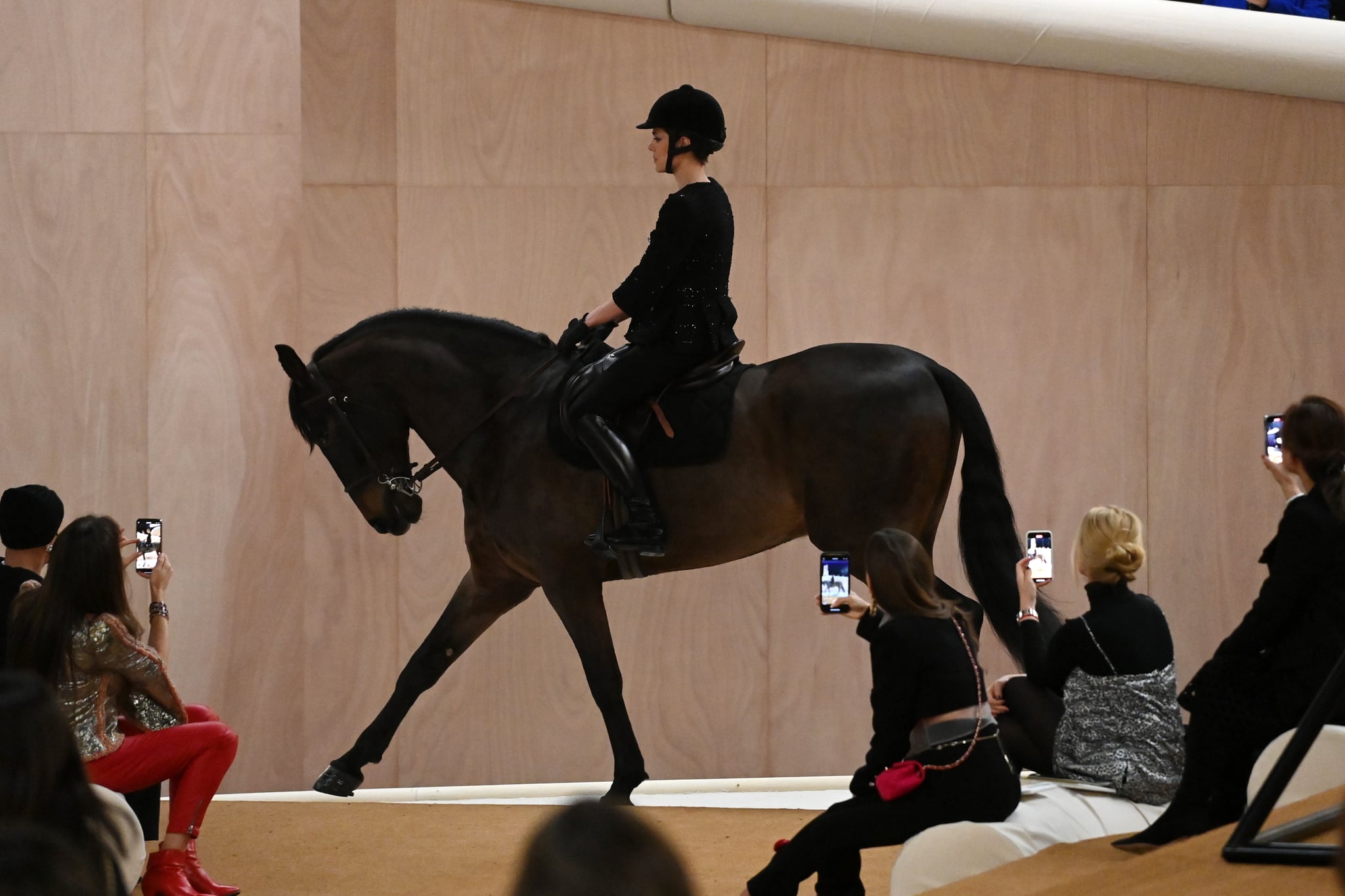 PARIS, FRANCE - JANUARY 25: (EDITORIAL USE ONLY - For Non-Editorial use please seek approval from Fashion House) Charlotte Casiraghi rides a horse on the runway during the Chanel Haute Couture Spring/Summer 2022 show as part of Paris Fashion Week at Le Grand Palais Ephemere on January 25, 2022 in Paris, France. (Photo by Pascal Le Segretain/Getty Images)