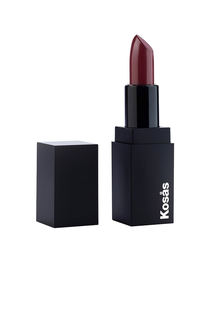 Why you need it: This highly pigmented dark shade is your new after-hours color. Plus it contains a bevy of natural ingredients, including antioxidant green tea, moisturizing mango butter, and fragrant sweet orange oil. 
Kosas Lipstick in Darkroom ($24)