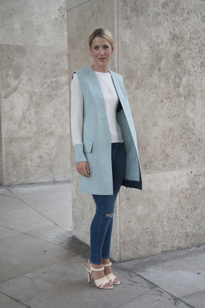 Take a casual outfit up a notch by pairing a sleek gray vest with a simple tailored top and jeans, giving it the perfect amount of elegance.