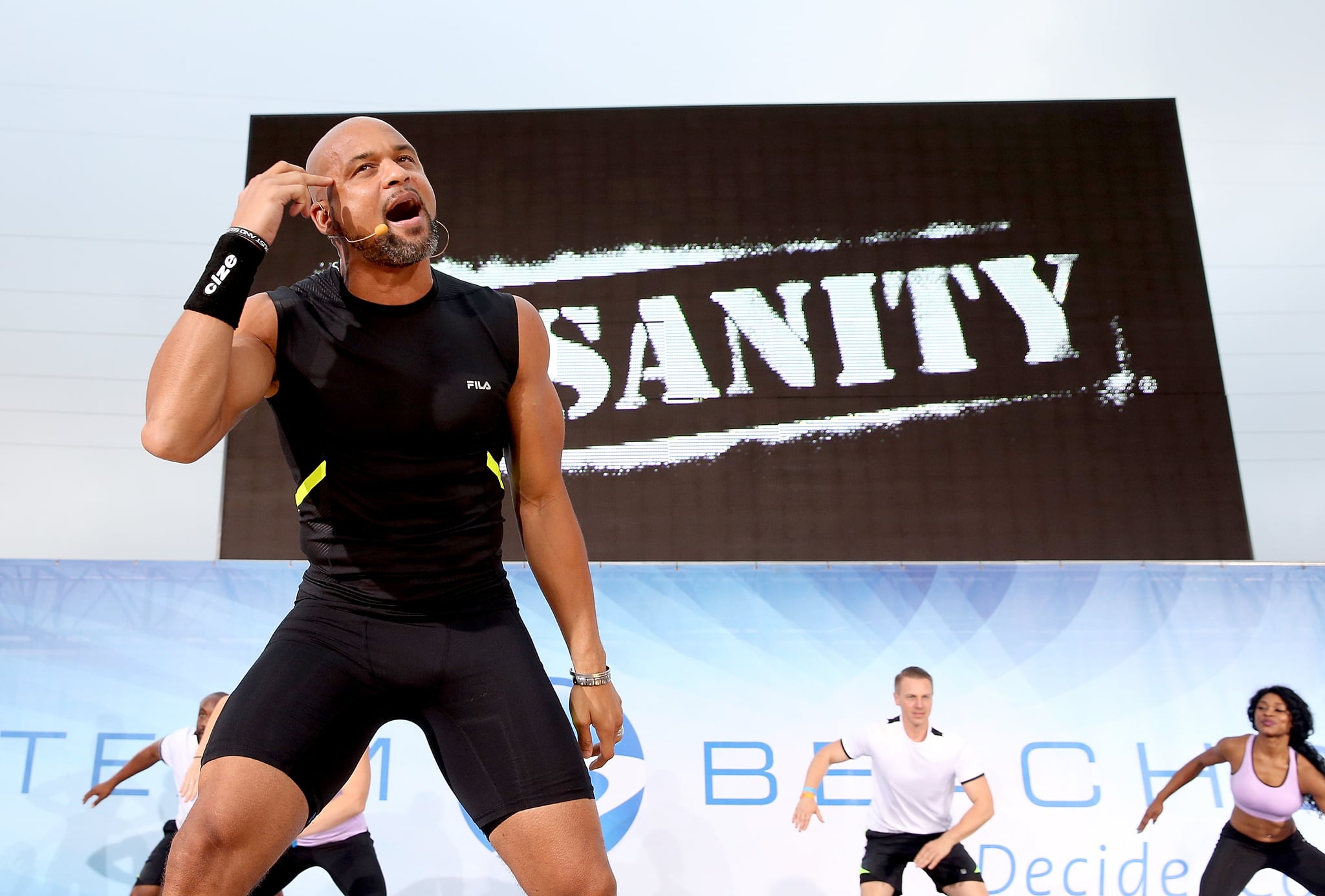 NASHVILLE, TN - JULY 30:  Super Trainer Shaun T. leads INSANITY at Beachbody's SUPER WORKOUT, where 25,000 coaches took over Broadway during the 2016 Beachbody Coach Summit on July 30, 2016 in Nashville, Tennessee.  (Photo by Terry Wyatt/Getty Images for Beachbody)