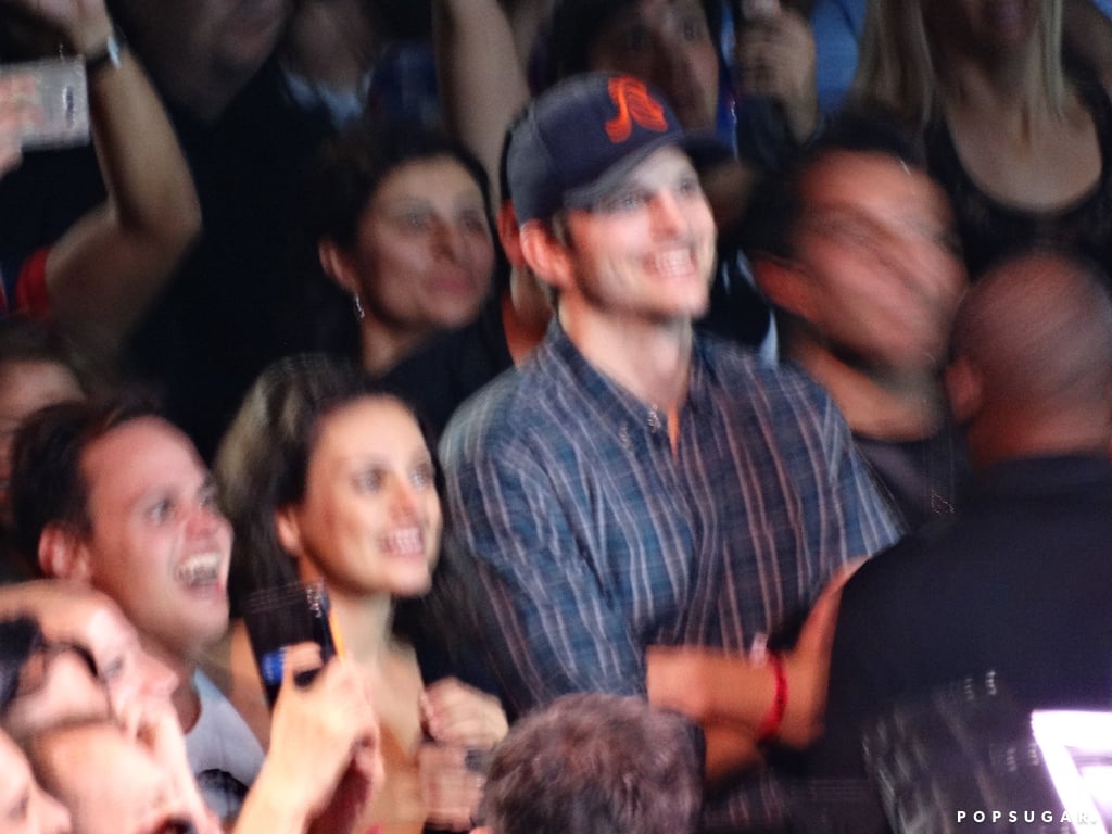 Mila Kunis and Ashton Kutcher at the Madonna Concert in LA