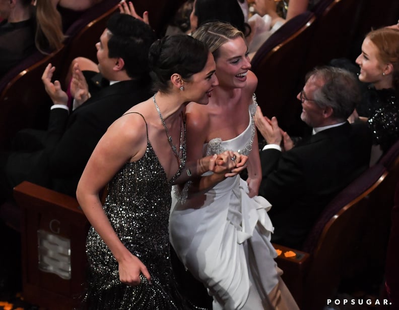 Gal Gadot and Margot Robbie held hands as they made their way through the aisle.