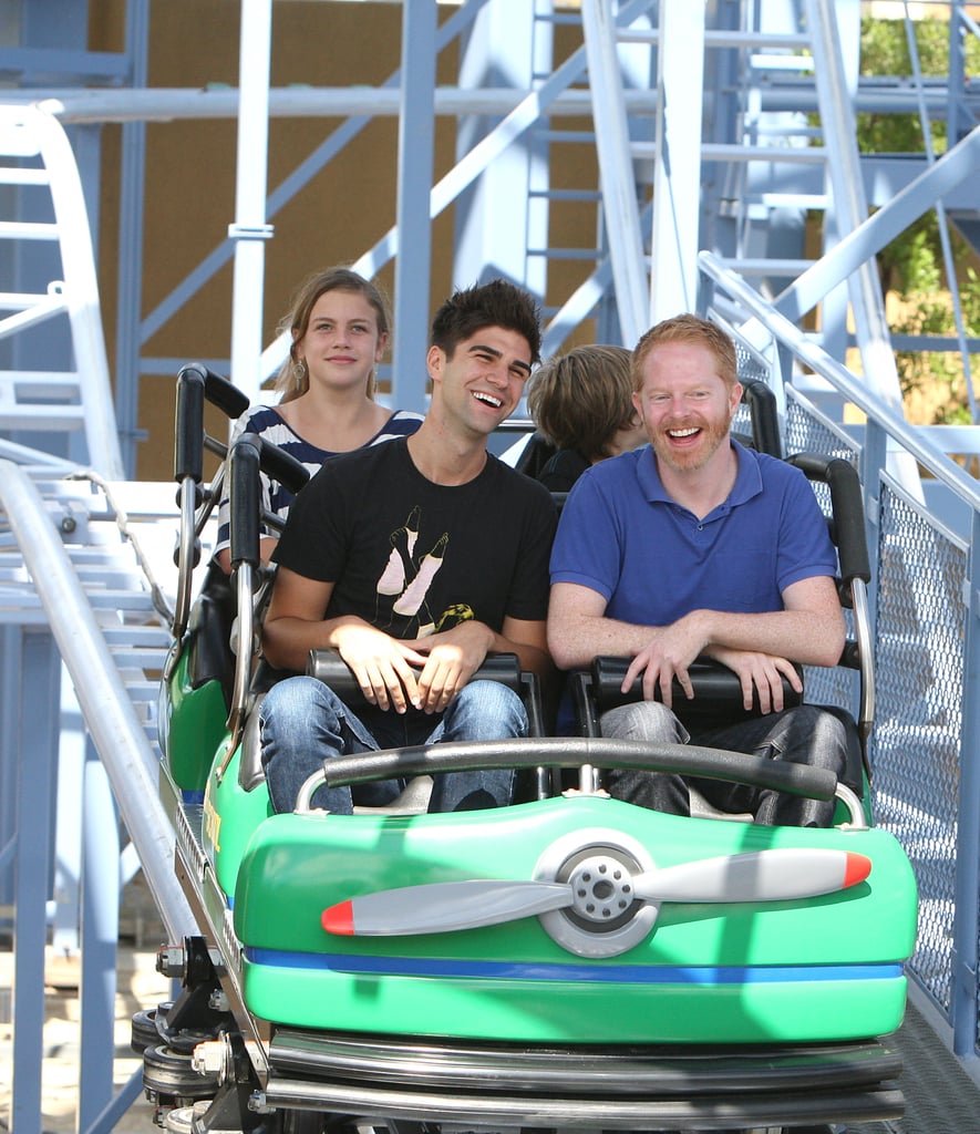 Jesse Tyler Ferguson and Justin Mikita hopped on a ride in July 2011.