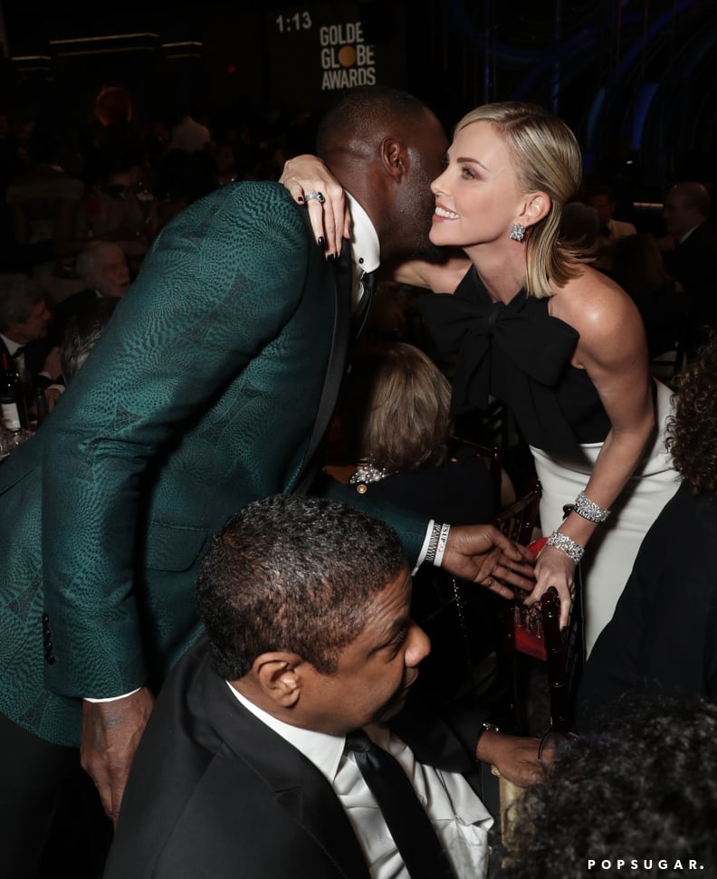 Denzel Washington Being a Dear and Moving Out of the Way So Charlize Theron Can Get a Proper Hug From Idris Elba