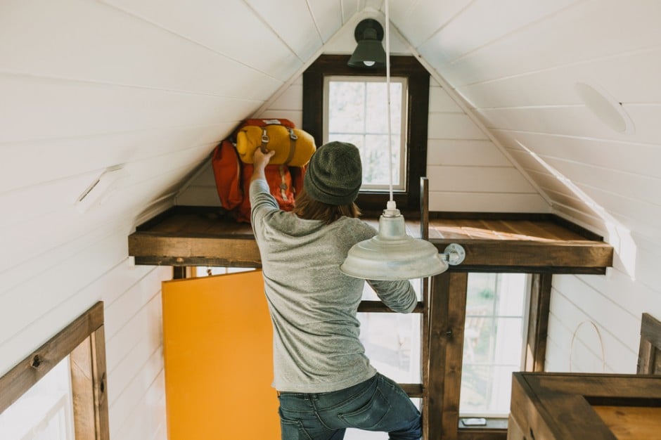 A Triangular Nook Near The Ceiling Includes A Ladder Bar For Easy