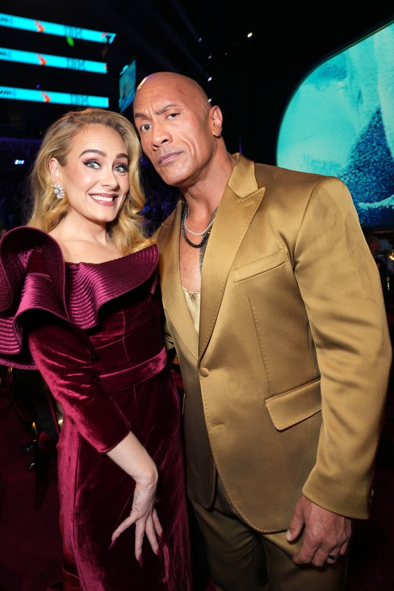 LOS ANGELES, CALIFORNIA - FEBRUARY 05: (L-R) Adele and Dwayne Johnson attend the 65th GRAMMY Awards at Crypto.com Arena on February 05, 2023 in Los Angeles, California. (Photo by Kevin Mazur/Getty Images for The Recording Academy)