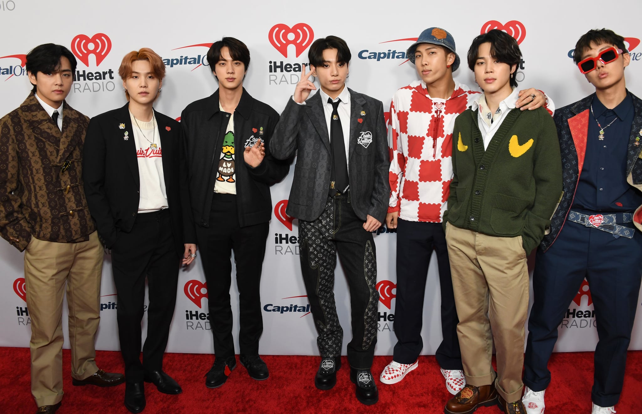 INGLEWOOD, CALIFORNIA - DECEMBER 03: (L-R) V, Suga, Jin, Jungkook, RM, Jimin, and J-Hope of BTS attend 102.7 KIIS FM's Jingle Ball 2021 Presented By Capital One at The Forum on December 03, 2021 in Inglewood, California. (Photo by Jon Kopaloff/WireImage)