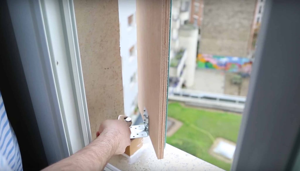 Then he screwed the mirrors inside the blocks . . .