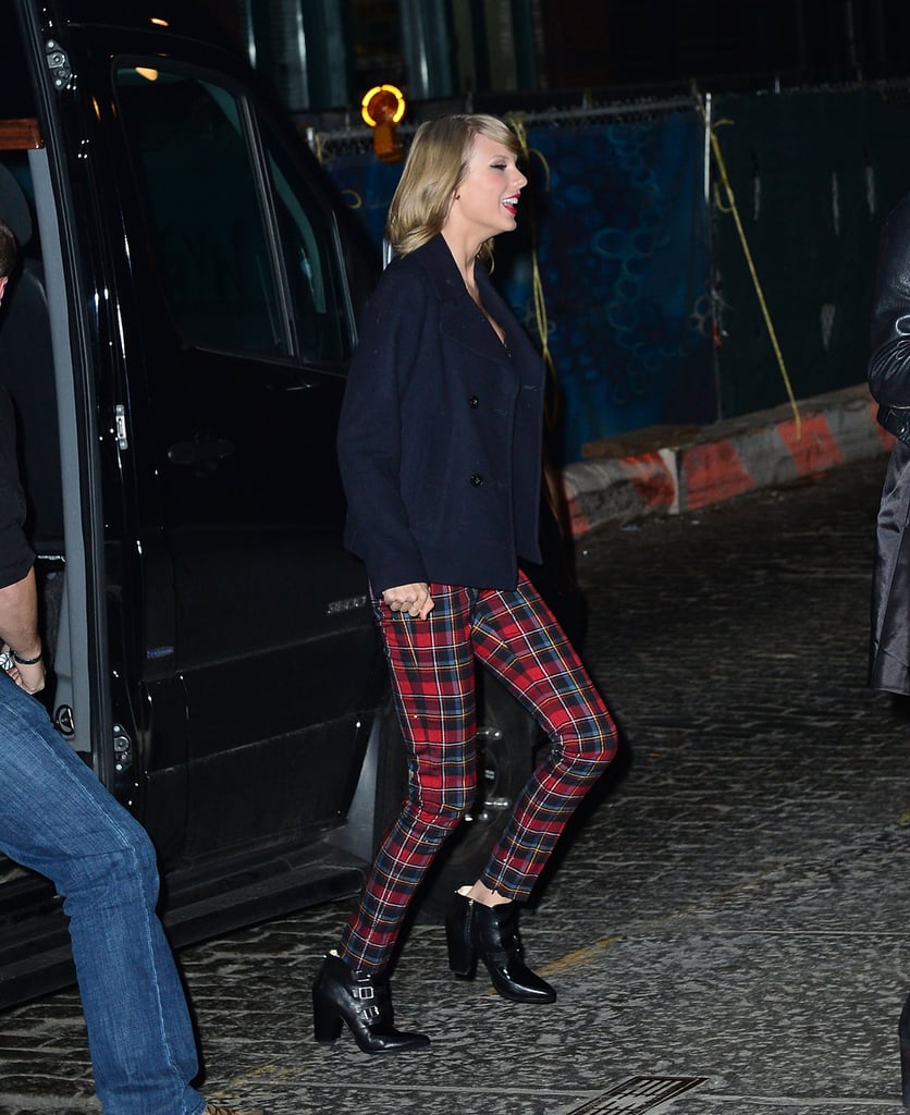 Taylor was all smiles as she arrived at her TriBeCa apartment for the party.