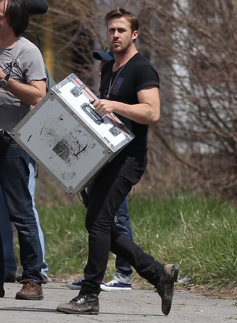 At this point, Ryan Gosling's shirt sleeves are ready to give up.