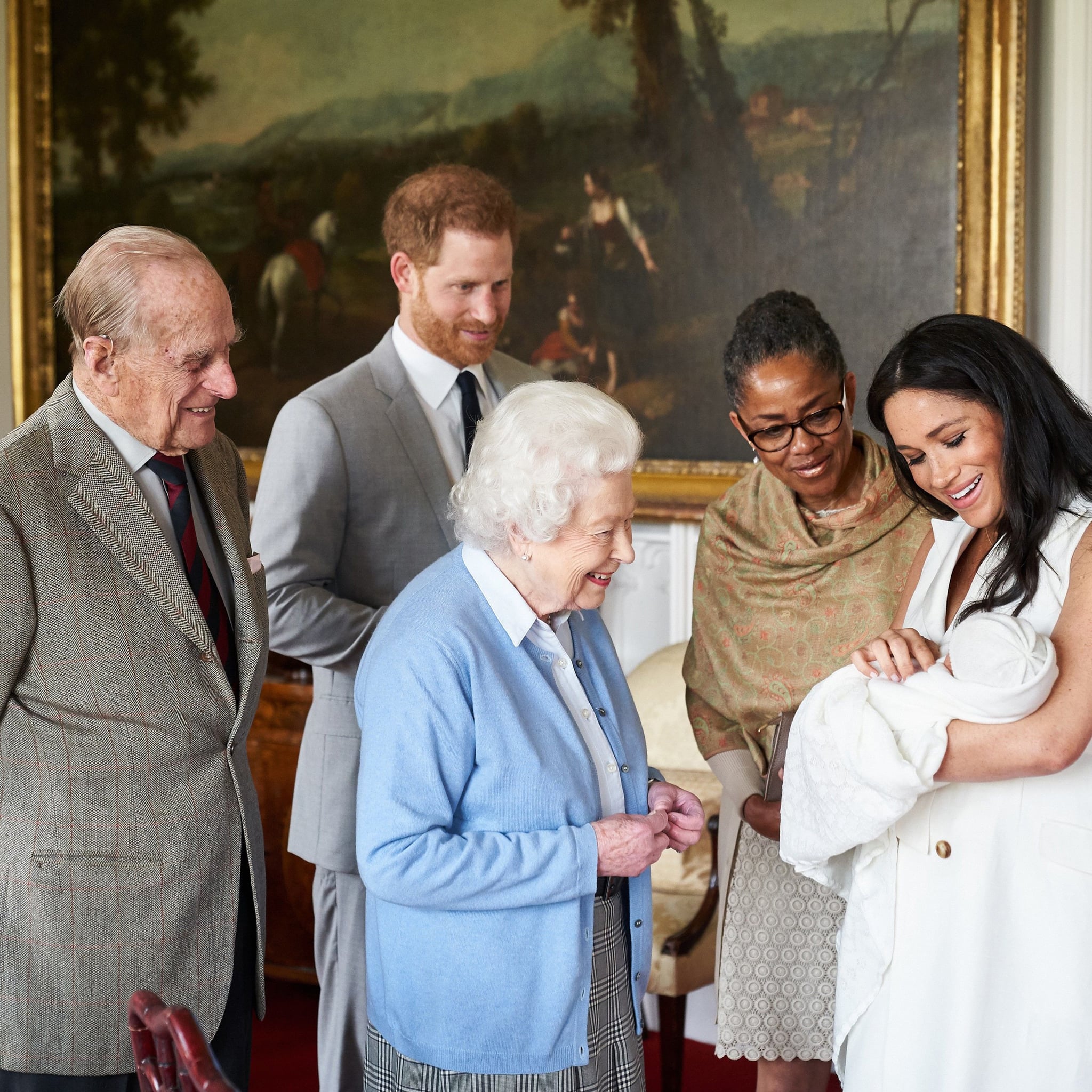 WINDSOR, ENGLAND - MAY 8: (NEWS EDITORIAL USE ONLY. NO COMMERCIAL USE. NO MERCHANDISING, ADVERTISING, SOUVENIRS, MEMORABILIA or COLOURABLY SIMILAR. NOT FOR USE AFTER FRIDAY JUNE 7, 2019, WITHOUT PRIOR WRITTEN PERMISSION FROM ROYAL COMMUNICATIONS AT BUCKINGHAM PALACE.) This photograph is provided to you strictly on condition that you will make no charge for the supply, release or publication of it and that these conditions and restrictions will apply (and that you will pass these on) to any organisation to whom you supply it. There shall be no commercial use whatsoever of the photographs (including by way of example only) any use in merchandising, advertising or any other non-news editorial use. The photograph must not be digitally enhanced, manipulated or modified in any manner or form and must include all of the individuals in the photograph when published. All other requests for use should be directed to the Buckingham Palace Press Office in writing.) Prince Harry, Duke of Sussex and Meghan, Duchess of Sussex are joined by her mother, Doria Ragland, as they show their new son, born on Monday and named as Archie Harrison Mountbatten-Windsor, to the Queen Elizabeth II and Prince Philip, Duke of Edinburgh at Windsor Castle on May 8, 2019 in Windsor, England.  (Photo by Chris Allerton/SussexRoyal via Getty Images)