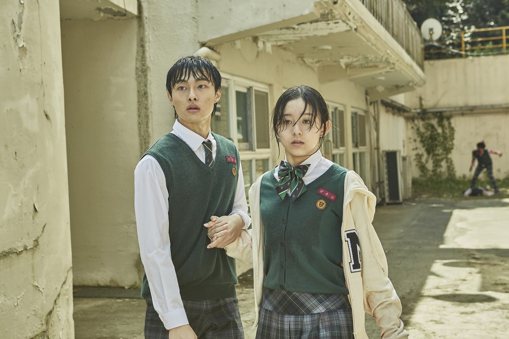 ALL OF US ARE DEAD, (aka JIGEUM URI HAKGYONEUN), from left: YOON Chan-Young, PARK Ji-hu, (Season 1, ep. 101, aired Jan. 28, 2022. photo: YANG Hae-sung / Netflix / Courtesy Everett Collection