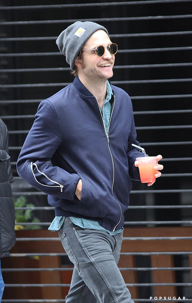 Robert Pattinson was all smiles as he walked around Toronto on Tuesday.