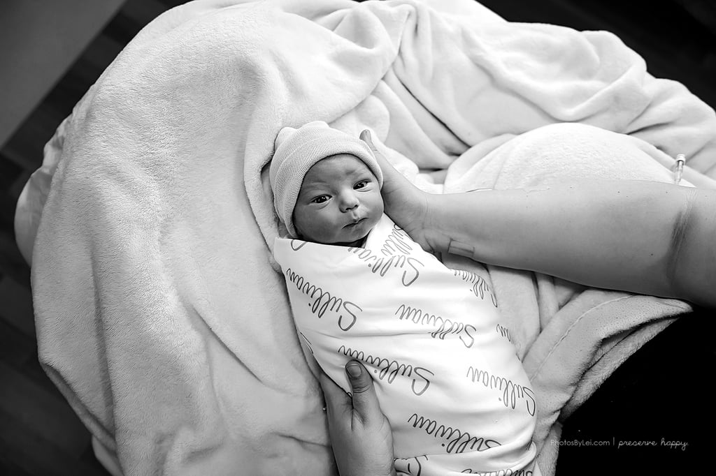 Sullivan wrapped up in a personalized swaddle.