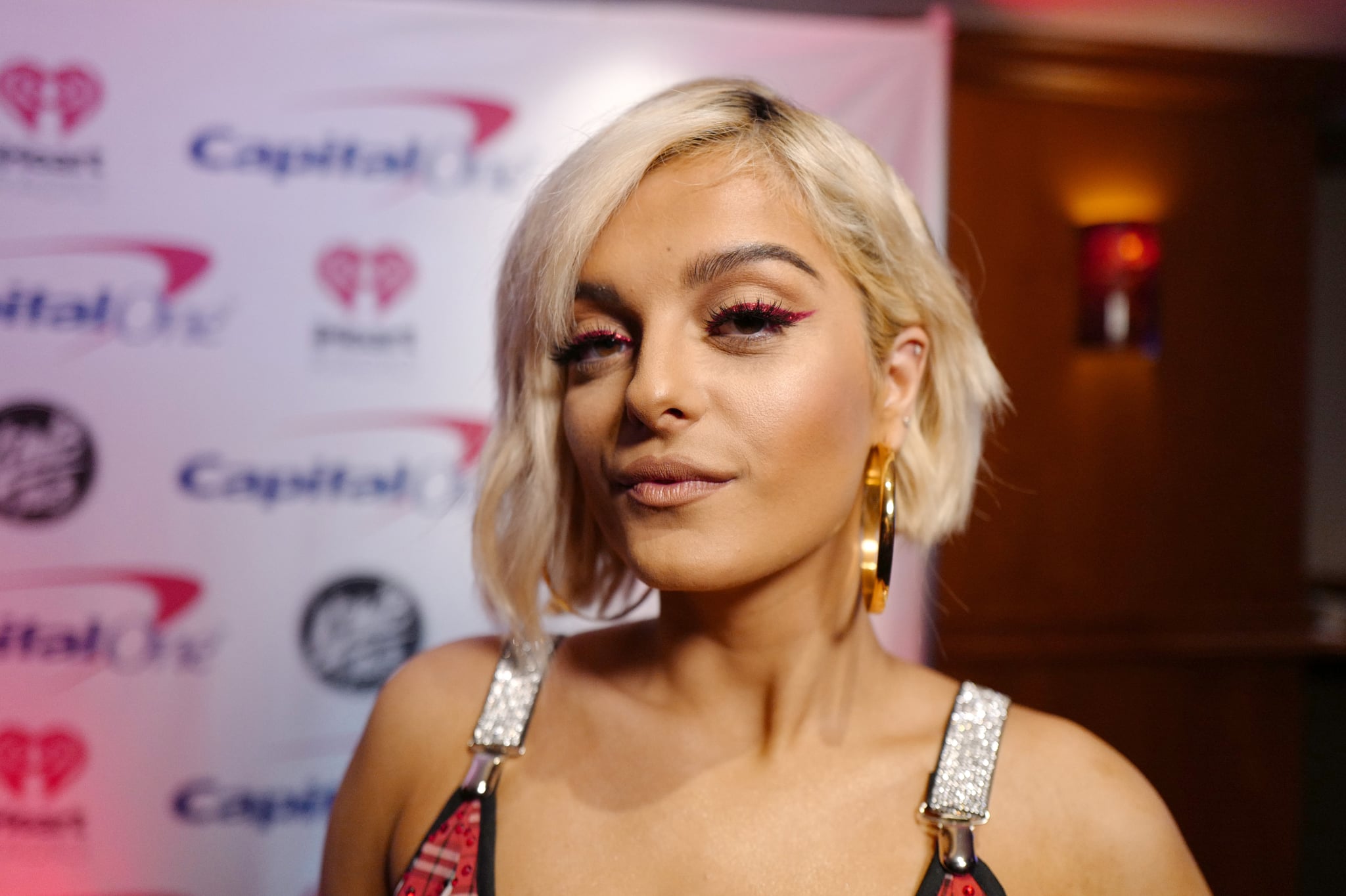 Bebe Rexha defends her father after he compared video to 'pornography'