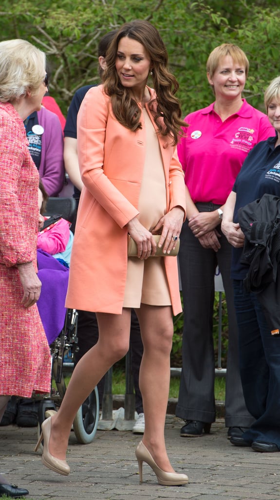 At Naomi House, Kate plumped for an apricot Tara Jarmon coat, with a peach dress underneath that was made by an unnamed independent dress-maker.